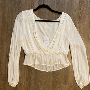 Cute white long sleeve top